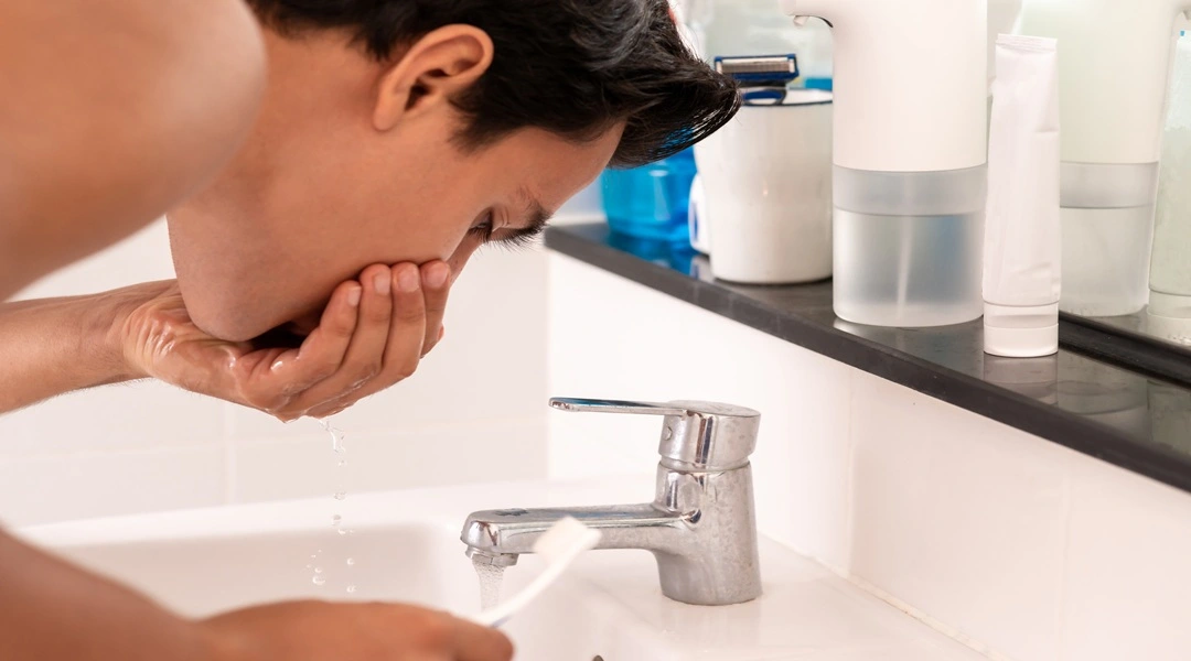 Plumber installing and maintaining household water filtration system - Plumbing Champions