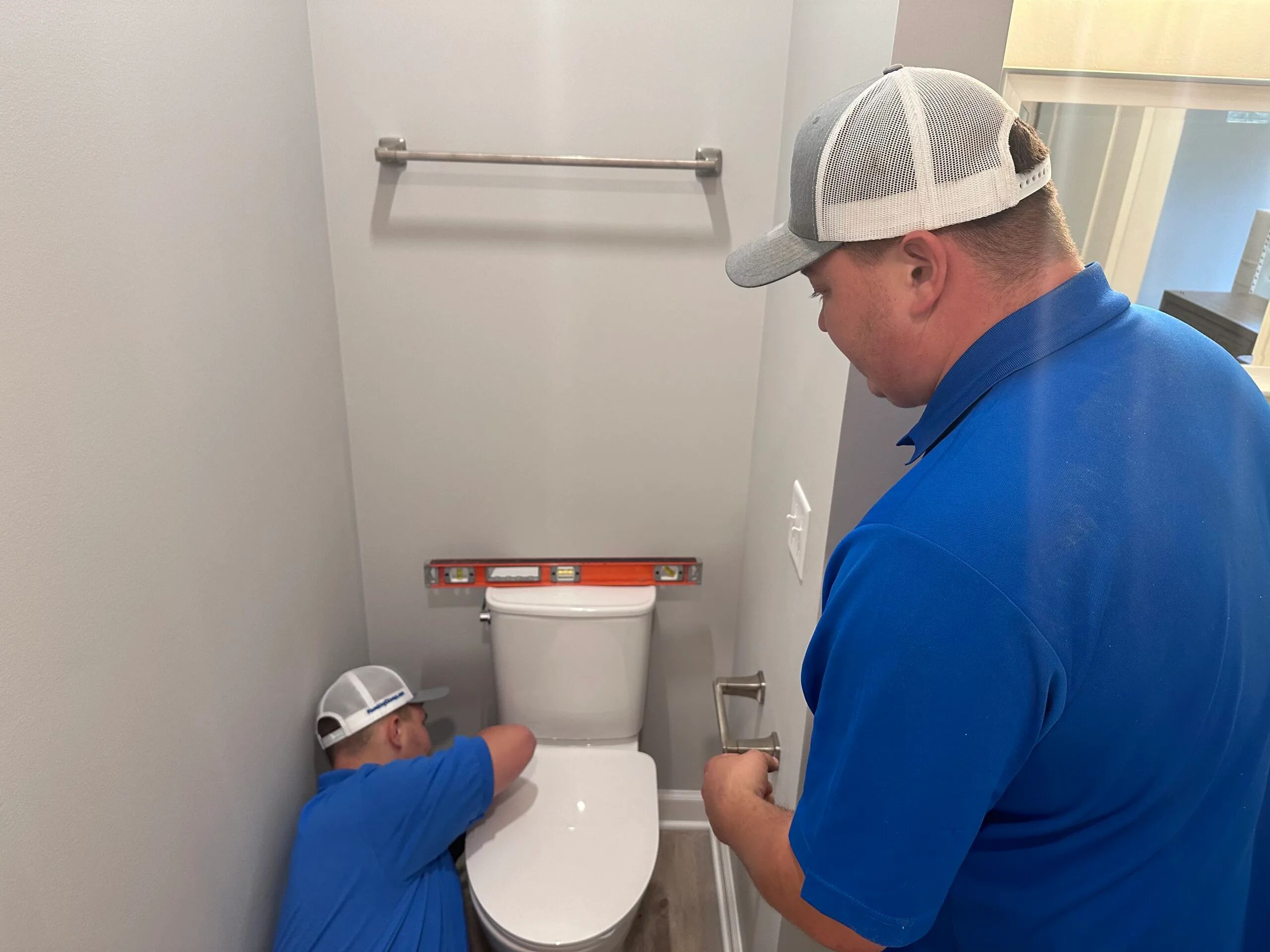 Expert plumber from Plumbing Champions repairing pipes in Penhook VA